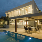 Modern backyard with pool, dining room and barbecue area