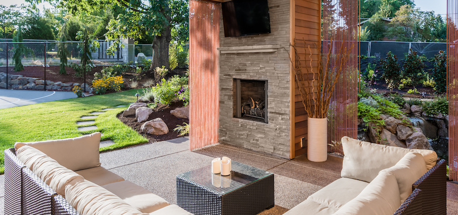A patio with retractable outdoor shades.